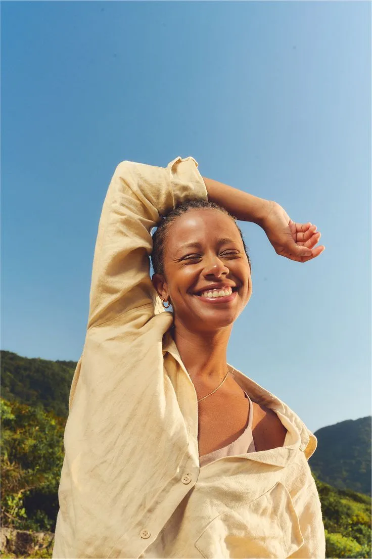 Woman enjoying a bright outdoor morning
